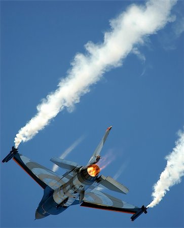 speed, smoke - F16 Jet Fighter Stock Photo - Budget Royalty-Free & Subscription, Code: 400-04429716