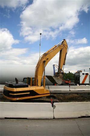 simsearch:400-06171776,k - Roadside Excavator Contructing a New Highway Stock Photo - Budget Royalty-Free & Subscription, Code: 400-04429787