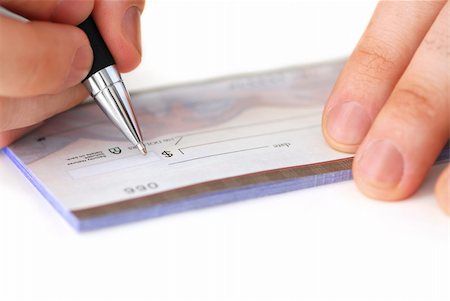 Closeup of man's hands writing a cheque Stock Photo - Budget Royalty-Free & Subscription, Code: 400-04429935