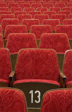 simsearch:400-04452784,k - empty red wooden cinema/theater seats, number 13 in the middle, Stock Photo - Budget Royalty-Free & Subscription, Code: 400-04429980