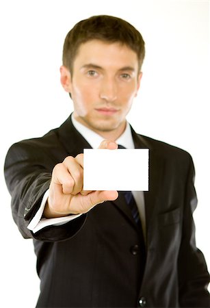 simsearch:400-05718318,k - Business man handing a blank business card over white background Foto de stock - Super Valor sin royalties y Suscripción, Código: 400-04420213