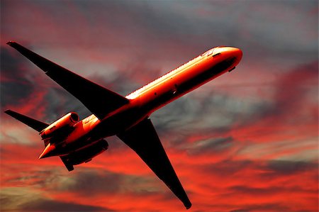 simsearch:400-04415546,k - Plane is flying while the sun is setting Stock Photo - Budget Royalty-Free & Subscription, Code: 400-04420306
