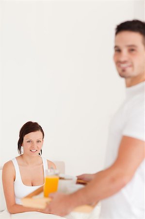 simsearch:400-04182849,k - Man bringing his wife breakfast in the bedroom Stock Photo - Budget Royalty-Free & Subscription, Code: 400-04420795