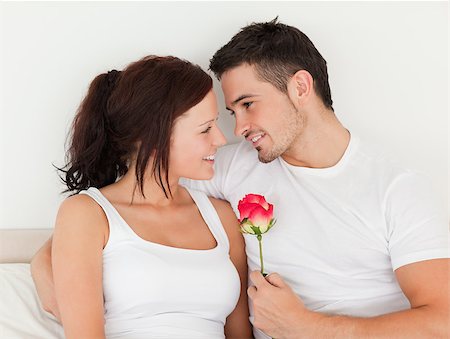 simsearch:400-04182849,k - Delightful couple with a rose in the bedroom Stock Photo - Budget Royalty-Free & Subscription, Code: 400-04420815