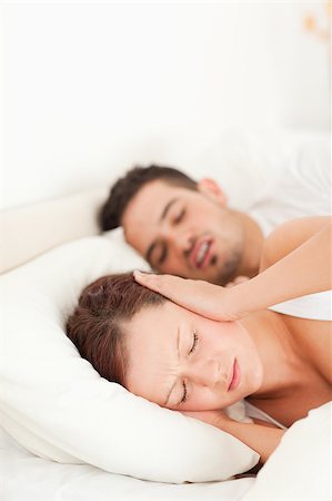 simsearch:400-04182849,k - Woman not able to sleep because of snoring in the bedroom Stock Photo - Budget Royalty-Free & Subscription, Code: 400-04420839