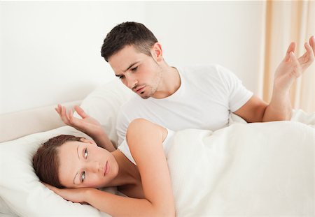 simsearch:400-04182849,k - Portrait of a Arguing couple in a bed in their bedroom Stock Photo - Budget Royalty-Free & Subscription, Code: 400-04420844