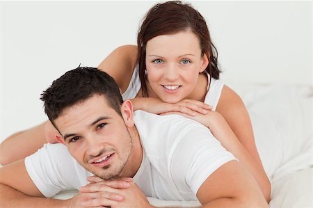 simsearch:400-04182849,k - Woman lying on her man in the bedroom Stock Photo - Budget Royalty-Free & Subscription, Code: 400-04420856