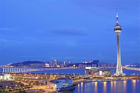 simsearch:400-08152599,k - Urban landscape of Macau with famous traveling tower under sky near river in Macao, Asia. Photographie de stock - Aubaine LD & Abonnement, Code: 400-04422106
