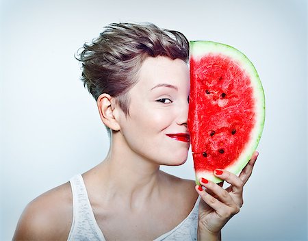 young beauty woman holding watermelon in her hand Stock Photo - Budget Royalty-Free & Subscription, Code: 400-04422367