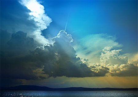 dark cloud over water - the beginning of the storm photo Stock Photo - Budget Royalty-Free & Subscription, Code: 400-04422362