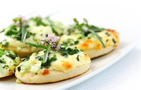 raw pizza - Small cakes with spinach and cheese as appetizer Stock Photo - Budget Royalty-Free & Subscription, Code: 400-04422704