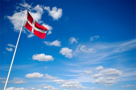 simsearch:400-05136582,k - The danish flag and blue and cloudy sky Stockbilder - Microstock & Abonnement, Bildnummer: 400-04422724