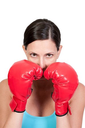 simsearch:400-04836306,k - A beautiful young woman wearing a pair of boxing gloves Photographie de stock - Aubaine LD & Abonnement, Code: 400-04423524