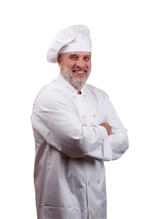 Portrait of a happy chef in a chef's hat and uniform isolated on a white background. Foto de stock - Super Valor sin royalties y Suscripción, Código: 400-04423538
