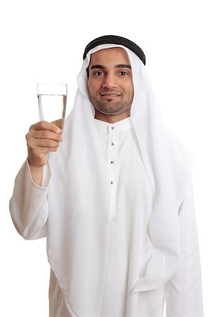 scarcity - A happy arab man holding up a glass of fresh safe drinking water. Stock Photo - Budget Royalty-Free & Subscription, Code: 400-04423651