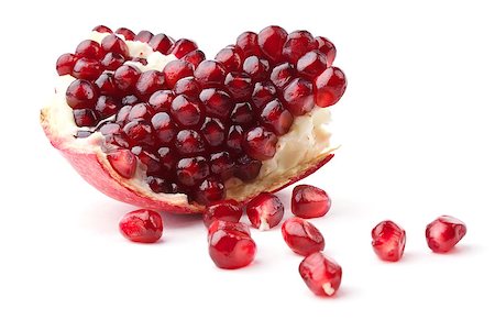 simsearch:400-04859130,k - Slice of pomegranate and juicy seeds isolated on white background Photographie de stock - Aubaine LD & Abonnement, Code: 400-04423667
