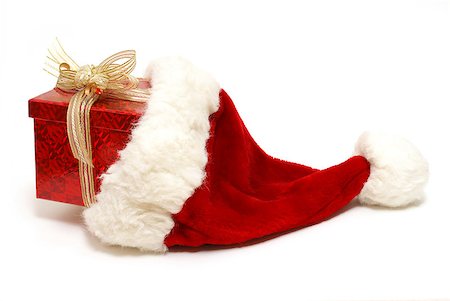 simsearch:400-04774270,k - An isolated shot of a Christmas present inside a santa hat. Stock Photo - Budget Royalty-Free & Subscription, Code: 400-04423702