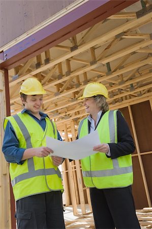 civil engineer and worker discussing issues at the construction site Stock Photo - Budget Royalty-Free & Subscription, Code: 400-04423905