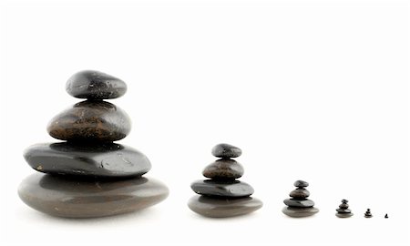 simsearch:400-04946108,k - Stacks of balanced stones with shadow on white background. Very shallow DOF Photographie de stock - Aubaine LD & Abonnement, Code: 400-04434030