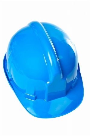 simsearch:400-04909076,k - Plastic blue hard hat on white background Photographie de stock - Aubaine LD & Abonnement, Code: 400-04434255