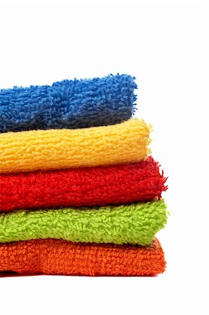 simsearch:400-06564793,k - Multicolour towels stacked with soft shadow on white background Photographie de stock - Aubaine LD & Abonnement, Code: 400-04434268