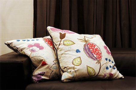 simsearch:400-03961189,k - Modern sofa with patterned cushions - home interiors Fotografie stock - Microstock e Abbonamento, Codice: 400-04434287