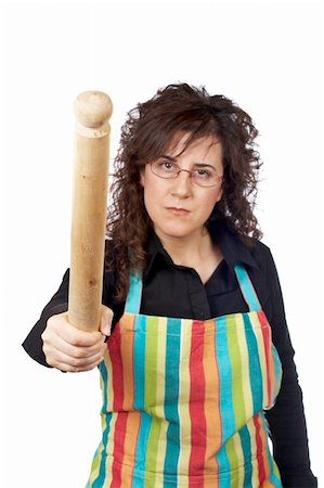 simsearch:400-04019890,k - Angered housewife in apron holding a wooden rolling Stock Photo - Budget Royalty-Free & Subscription, Code: 400-04434472