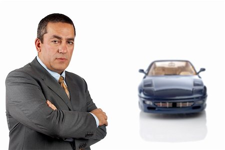 simsearch:694-03557973,k - Serious CEO who is in front of a car reflected in the bottom. Car blurred Stockbilder - Microstock & Abonnement, Bildnummer: 400-04434794