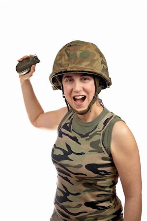 A beautiful soldier girl holding a hand grenade on white background Stock Photo - Budget Royalty-Free & Subscription, Code: 400-04434847