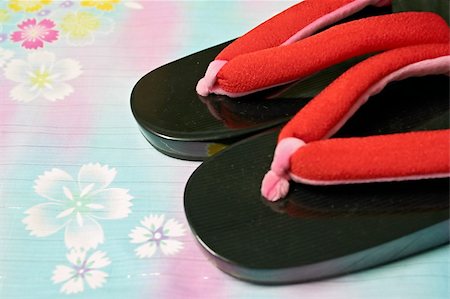 Japanese slippers (geta) on an oriental kimono fabric Stock Photo - Budget Royalty-Free & Subscription, Code: 400-04434907