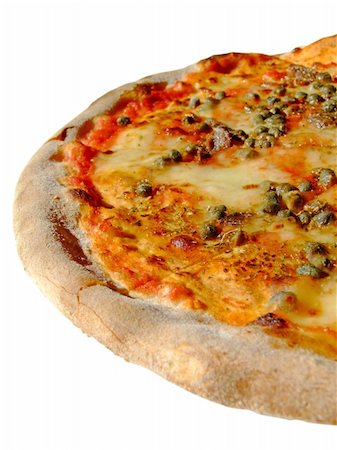 Original italian pizza, with mozzarella, tomato, anchovies, capers and oregano Photographie de stock - Aubaine LD & Abonnement, Code: 400-04435566