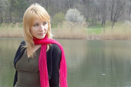 sad and quiet woman - Loney girl in red scarf on the lake. Stock Photo - Budget Royalty-Free & Subscription, Code: 400-04437177