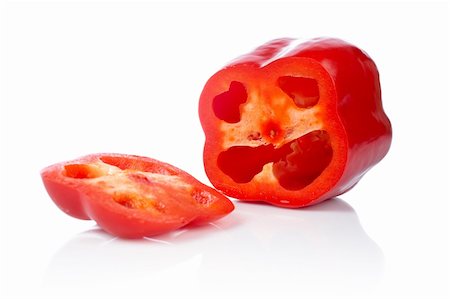 simsearch:400-05065763,k - A fresh and tasty red pepper slices reflected on white background. Shallow DOF Stockbilder - Microstock & Abonnement, Bildnummer: 400-04437450