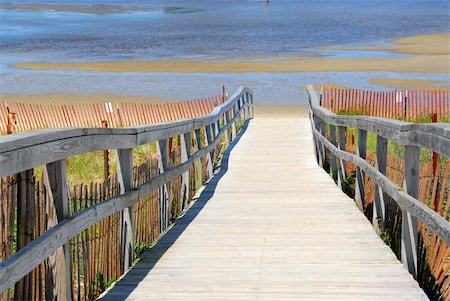 elevated pedestrian walkways - Wooden path over sand dunes with beach view Stock Photo - Budget Royalty-Free & Subscription, Code: 400-04437483
