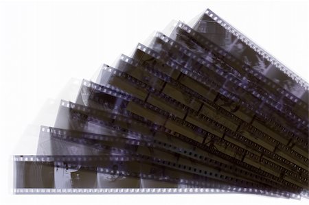 35 mm films isolated on white Stock Photo - Budget Royalty-Free & Subscription, Code: 400-04437540