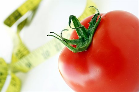 physical fit food - Tomato with measuring tape Stock Photo - Budget Royalty-Free & Subscription, Code: 400-04437750