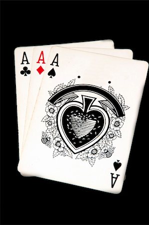 simsearch:400-03949924,k - Three aces on a black back ground Stock Photo - Budget Royalty-Free & Subscription, Code: 400-04437790