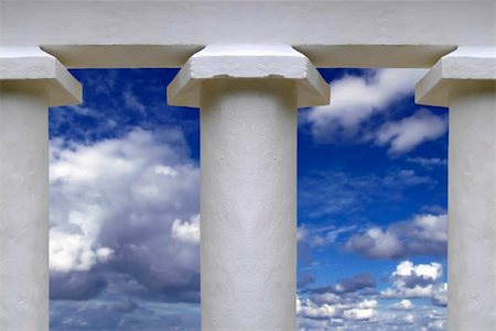 White temple pillars against summery blue sky Stock Photo - Budget Royalty-Free & Subscription, Code: 400-04438089