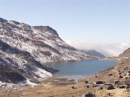 sikkim - This image of Tsango lake was taken in the month of December, on the way to Nathu La from Gangtok which if viewed carefully can be seen to have partially frozen and the afternoon clouds setting in at a distance. Stock Photo - Budget Royalty-Free & Subscription, Code: 400-04438544