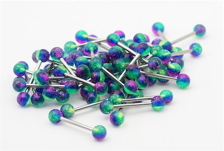 surgical steel - A giant pile of colorful tongue rings. Stock Photo - Budget Royalty-Free & Subscription, Code: 400-04438770