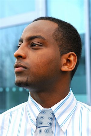 simsearch:400-03916433,k - Portrait of a young attractive businessman next to a corporate building Foto de stock - Super Valor sin royalties y Suscripción, Código: 400-04438904