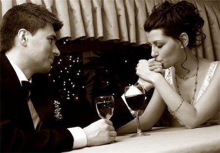 simsearch:400-07332647,k - Recently married pair at restaurant in celebrating on romantic date. b/w+sepia Stockbilder - Microstock & Abonnement, Bildnummer: 400-04439084