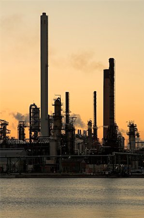 simsearch:400-04623195,k - Oil refinery at sunset in Anwerp port Stock Photo - Budget Royalty-Free & Subscription, Code: 400-04439218