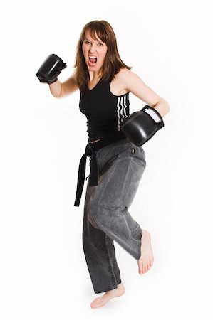 simsearch:400-04558212,k - woman wearing karate gloves over white background Stock Photo - Budget Royalty-Free & Subscription, Code: 400-04439332