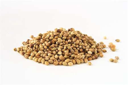 simsearch:652-03800193,k - whole dhania coriander, isolated on white. Shallow depth of field, focused on the centre of the pile. Photographie de stock - Aubaine LD & Abonnement, Code: 400-04430126