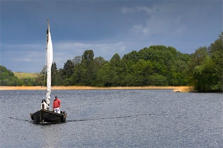 Boat on the lake. Picture taken in Trakai / Lithuania Foto de stock - Super Valor sin royalties y Suscripción, Código: 400-04430456