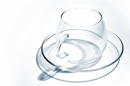 Transparent glass tea cup on a white background Foto de stock - Super Valor sin royalties y Suscripción, Código: 400-04430585