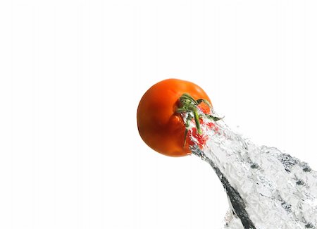 Tomato flying out of the water Photographie de stock - Aubaine LD & Abonnement, Code: 400-04430589