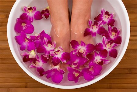 smelling feet - Spa treatment with beautiful orchids Stock Photo - Budget Royalty-Free & Subscription, Code: 400-04430700