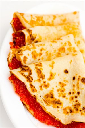 simsearch:400-04262580,k - Pancakes with red caviar on a plate (Traditional russian dish) Stock Photo - Budget Royalty-Free & Subscription, Code: 400-04430873